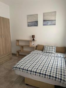 Posteľ alebo postele v izbe v ubytovaní Casa Niky 25