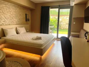 Postel nebo postele na pokoji v ubytování Avwan Hotel Çiğli