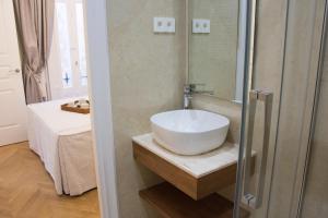 Ванная комната в Apartamento Alaia +10 фотографий