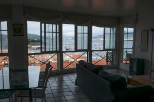 Posedenie v ubytovaní Maravilloso apartamento con vistas al mar