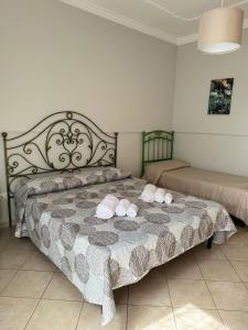A bed or beds in a room at La casa del mulino Még 28 kép
