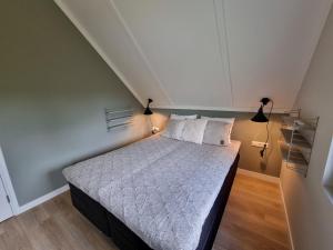 Postel nebo postele na pokoji v ubytování Lutz Watervilla's Balk