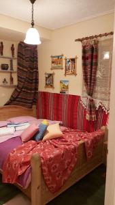 En eller flere senger på et rom på Livadi Chalet Arachova The perfect family vacation