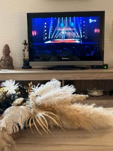 a tv sitting on top of a shelf with a tv screen at Beo shooping centar in Belgrade +29 photos