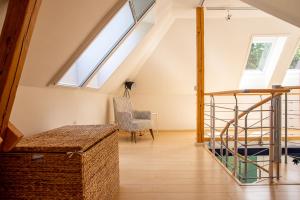 En eller flere senge i et værelse på Atelierhaus Glücksburg Sandwig