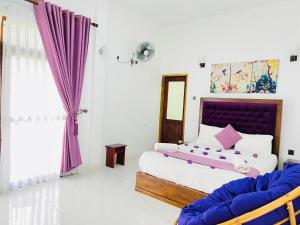 Letto o letti in una camera di Heaven Breeze