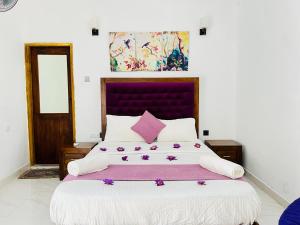 Letto o letti in una camera di Heaven Breeze
