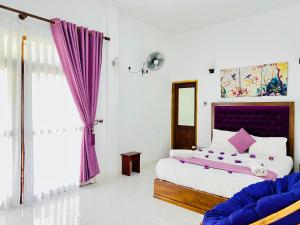 Letto o letti in una camera di Heaven Breeze