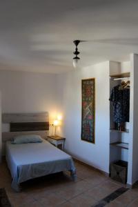 A bed or beds in a room at Casa del Arrabal