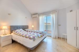 En eller flere senge i et værelse på Townhouse Sonora + 30 billeder