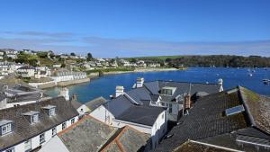 a view of a harbor with houses and a river at Pennant in Saint Mawes