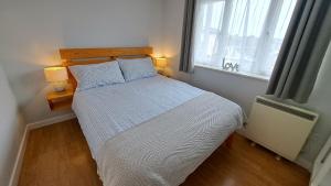 Postel nebo postele na pokoji v ubytování Pelyn