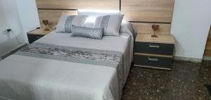 Postel nebo postele na pokoji v ubytování APARTAMENTO TURISTICO GUADIANA LOFT EXPERIENCE Dalia