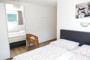 Łóżko lub łóżka w pokoju w obiekcie Appartement Mauterndorf