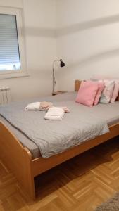 Postel nebo postele na pokoji v ubytování Apartman Sunce