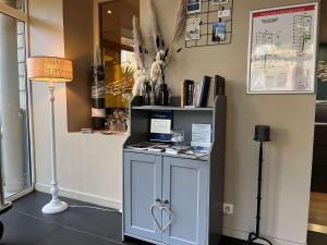 a room with a counter with a heart on it at Hotel Best Western La Mare Ô Poissons in Ouistreham