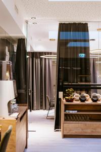 Predel za sedenje v nastanitvi BEE GREEN Linz Self-Check-in-Hotel