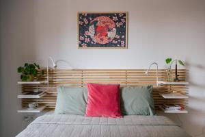 Łóżko lub łóżka w pokoju w obiekcie Nadwiślańska11 - Klimatyczny apartament tuż nad Wisłą