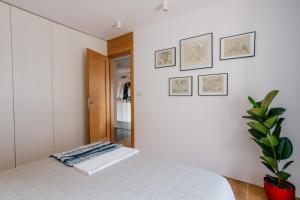 Łóżko lub łóżka w pokoju w obiekcie Nadwiślańska11 - Klimatyczny apartament tuż nad Wisłą