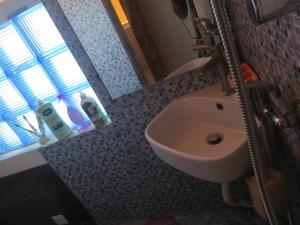 Ένα μπάνιο στο Casa de Nômades Digitais