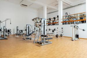 a gym with several treadmills and machines at Royal Sunset Beach Club in Adeje