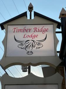 a sign for a timber ridge lodge at Timber Ridge Lodge - Walking Distance from Downtown Gatlinburg in Gatlinburg