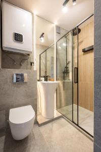 Kúpeľňa v ubytovaní Krupówki i Styl, Krupówki Inn i Studio Miła w Centrum przy Krupówkach APARTZAKOP