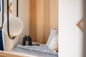 Posteľ alebo postele v izbe v ubytovaní Krupówki i Styl, Krupówki Inn i Studio Miła w Centrum przy Krupówkach APARTZAKOP