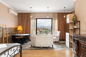 a hotel room with a bed and a window at Honeymoon Apartments in Old Tbilisi in Tbilisi City