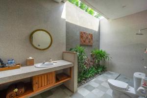 Koupelna v ubytování De Rekun Ubud