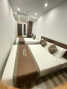 Кровать или кровати в номере GOODTECH LUXURY Hotel & Apartment