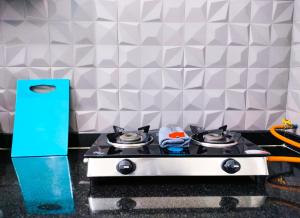 Dapur atau dapur kecil di Elegano Serviced Apartments