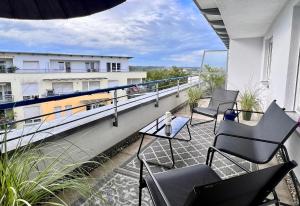 Un balcon sau o terasă la Penthouse Outlet Metzingen