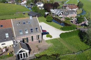 Fotografie z fotogalerie ubytování Luxe woonboerderij in de natuur. v destinaci Nieuwkoop