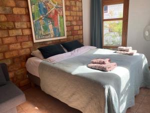Postel nebo postele na pokoji v ubytování House of Sun