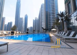 Басейн в Fully Furnished 1 Bed in Downtown Dubai, Hosted by Desert City Stays або поблизу