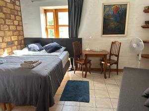 Postel nebo postele na pokoji v ubytování House of Sun