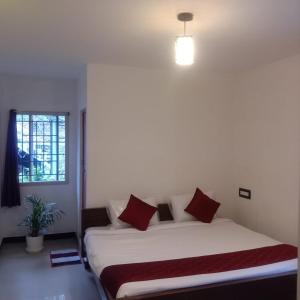 Olive Rooms Kodaikanal with WiFi, Spacious Rooms, Parking, Nearby Homemade Food 객실 침대