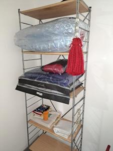 a metal bunk bed in a room at El Pericon y Belgrano in Punta Indio