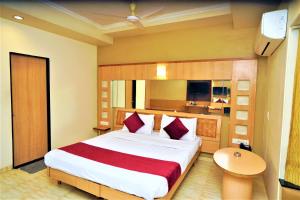 Postel nebo postele na pokoji v ubytování New Hotel Europa Inn