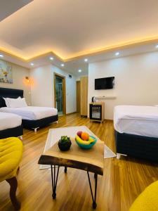 A bed or beds in a room at PALMERA ART HOUSE