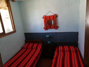 Ένα ή περισσότερα κρεβάτια σε δωμάτιο στο centro piria apartamento 5