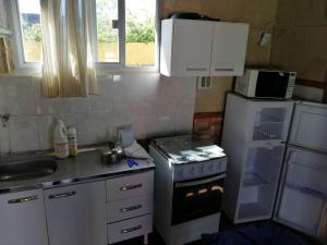 Η κουζίνα ή μικρή κουζίνα στο centro piria apartamento 5