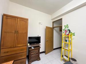 TV in/ali zabaviščno središče v nastanitvi Jiajia Inn