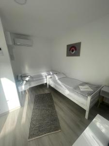 Uma cama ou camas num quarto em Temački konaci