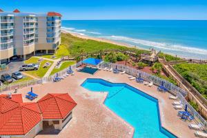 an aerial view of a resort with a pool and the beach at NTBSR3404 St Regis 3404 in North Topsail Beach