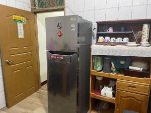 Kuhinja oz. manjša kuhinja v nastanitvi Jiajia Inn