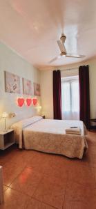 A bed or beds in a room at Casa de Huespedes Dolce Vita