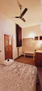 A bed or beds in a room at Casa de Huespedes Dolce Vita