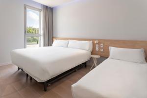 B&B HOTEL Lleida客房内的一张或多张床位